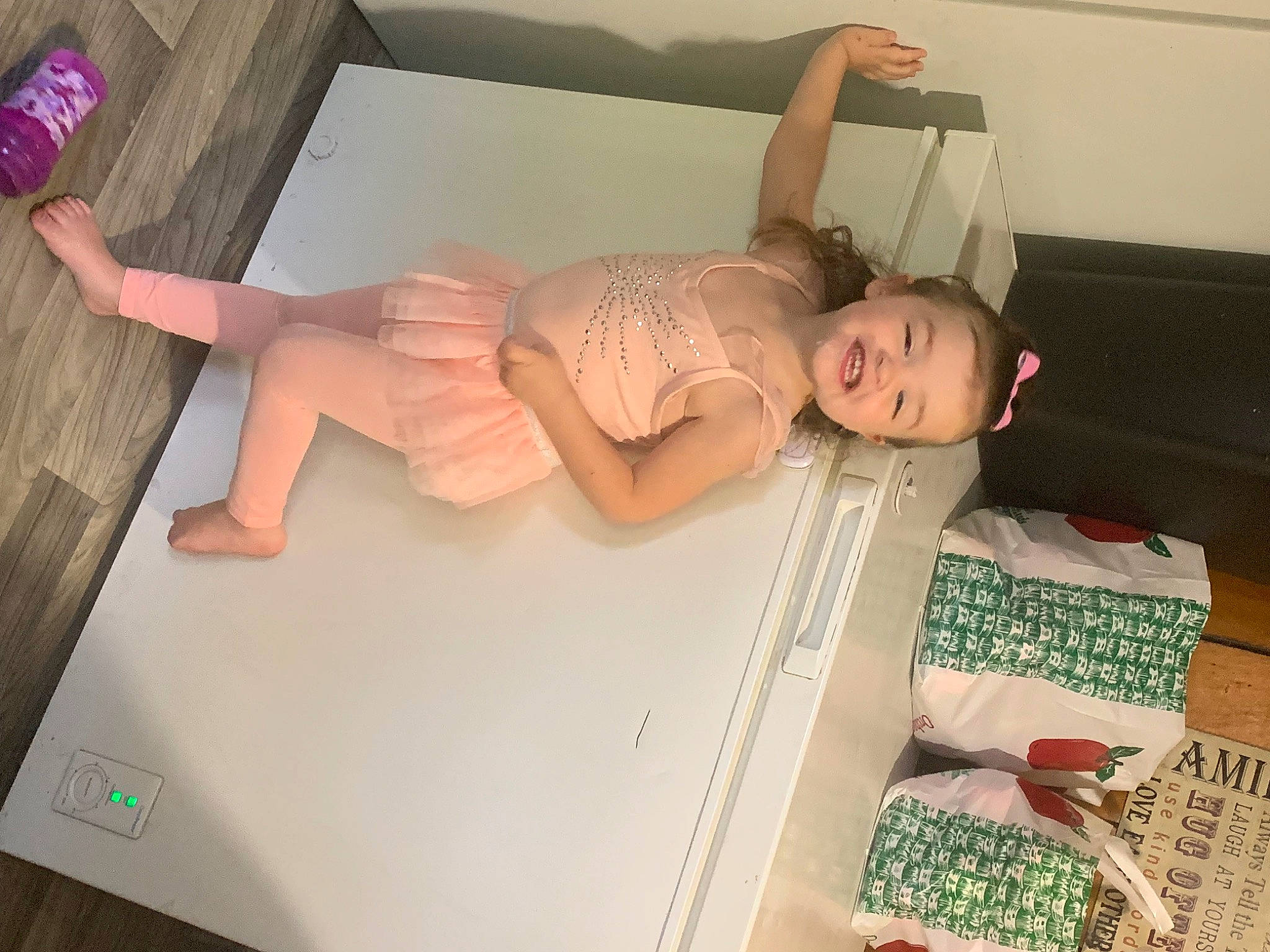 Maya is registered to the contest to win money with this photo: abdomen, baby, chest, child, comfort, flesh, flooring, foot, fun, hardwood, human_leg, joy, knee, linens, person, room, thigh, toddler, visual_arts, wood