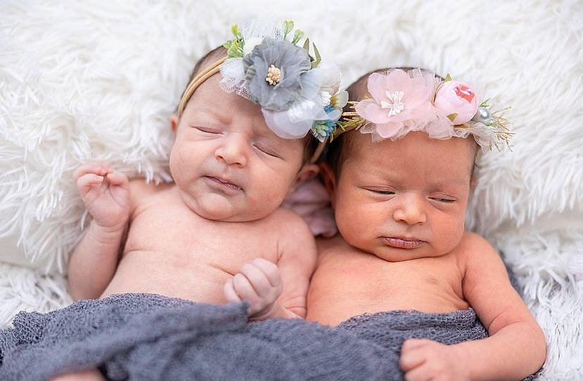 Avery joined the competition — help win amazing prizes! baby, baby_products, baby_toddler_clothing, cheek, child, comfort, eye, face, flower, grass, happy, headband, headgear, headpiece, headwear, iris, jewellery, person, petal, pink