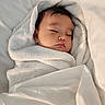 baby, bed, bedding, blanket, closed_eyes, cozy, face, head, indoors, infant, nap, newborn, peaceful, photography, portrait, resting, sleeping, snug, soft_lighting, white_blanket
