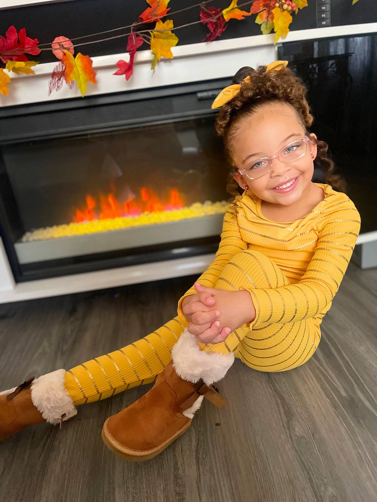 Carlie joined the competition — help win amazing prizes! child, fireplace, flooring, foot, fun, gas, gesture, happy, hardwood, heat, human_body, human_leg, joy, leisure, orange, person, smile, snapshot, thumb, toddler