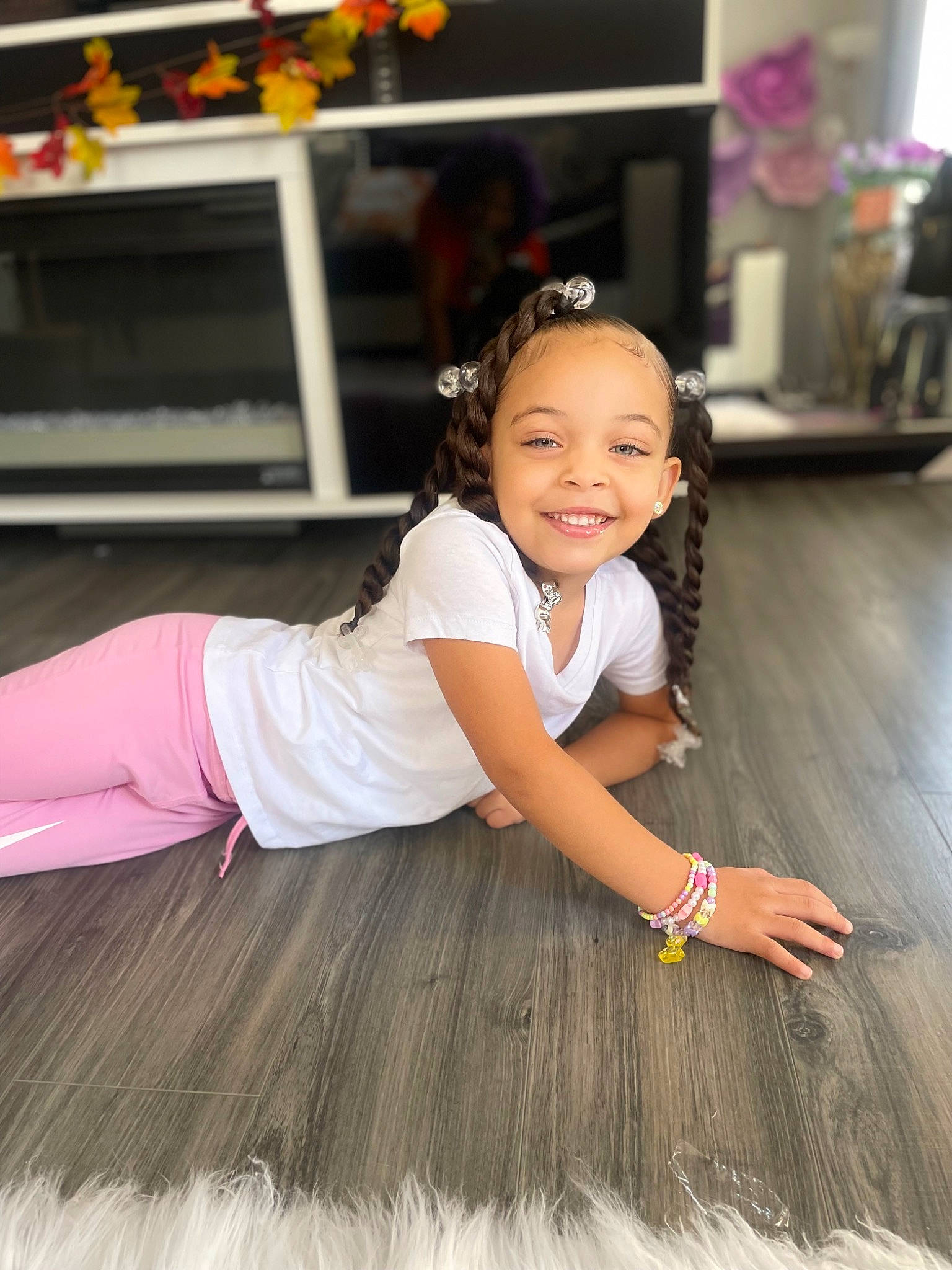 Carlie joined the competition — help win amazing prizes! black_hair, child, facial_expression, fashion_design, flash_photography, floor, flooring, hair, happy, hardwood, human_leg, jewellery, joy, long_hair, person, pink, skin, smile, thigh, toddler