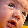 baby, infant, child, portrait, close_up, face, eyes, blue_eyes, open_mouth, curious, looking_up, skin, hair, eyelashes, nose, lips, indoor, warm_lighting, yellow_background, photography