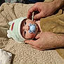 baby, infant, pacifier, towel, blanket, hands, hood, cute, soft, bed, resting, comfort, skin, closeup, newborn, person, sleepwear, indoor, parent, care
