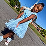 child, girl, portrait, outdoor, street, dress, blue_dress, princess_dress, shoes, sneakers, socks, church, steeple, sky, sunny, residential_area, asphalt, standing, posing, fashion