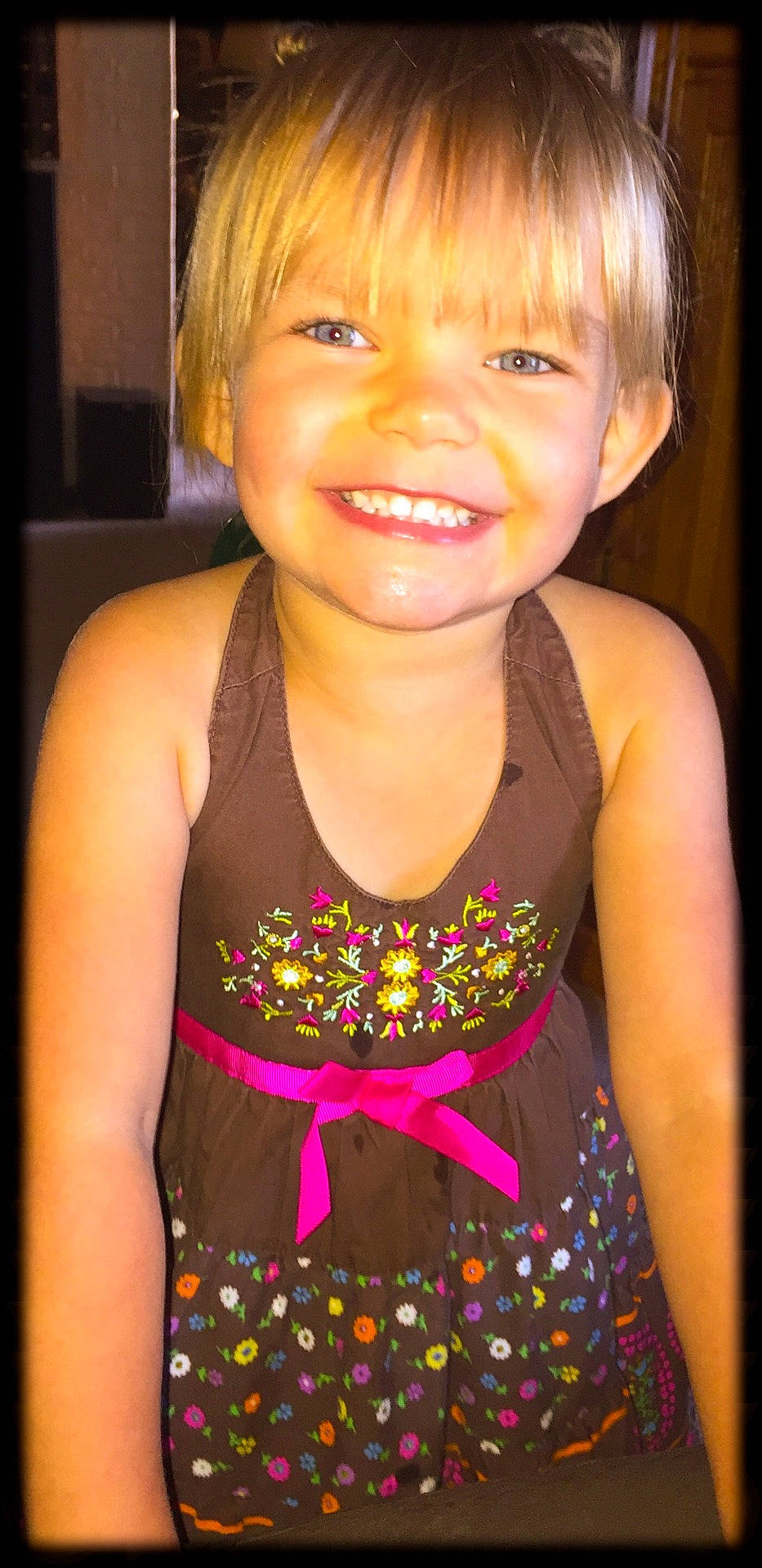 Payton is registered to the contest to win money with this photo: bangs, blond, brown_hair, cheek, child, child_model, eye, facial_expression, fun, girl, hair, hair_coloring, hairstyle, human_hair_color, iris, joy, organ, person, pink, skin