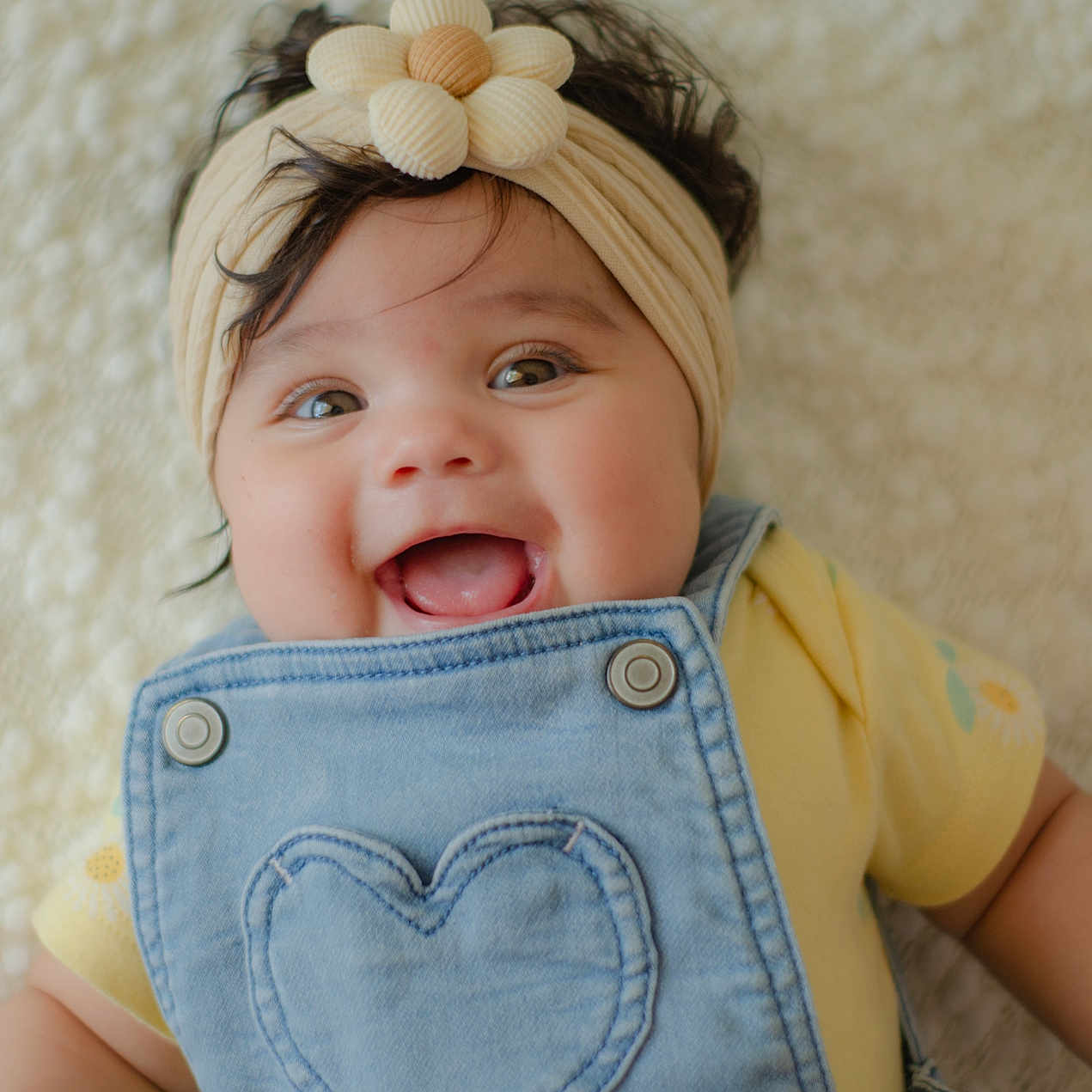 Zharmyah joined the competition — help win amazing prizes! accessories, baby, babylaughing, bodypart, clothing, coat, face, finger, hand, happy, head, headband, jacket, laughing, mouth, pants, person, photography, portrait, smile