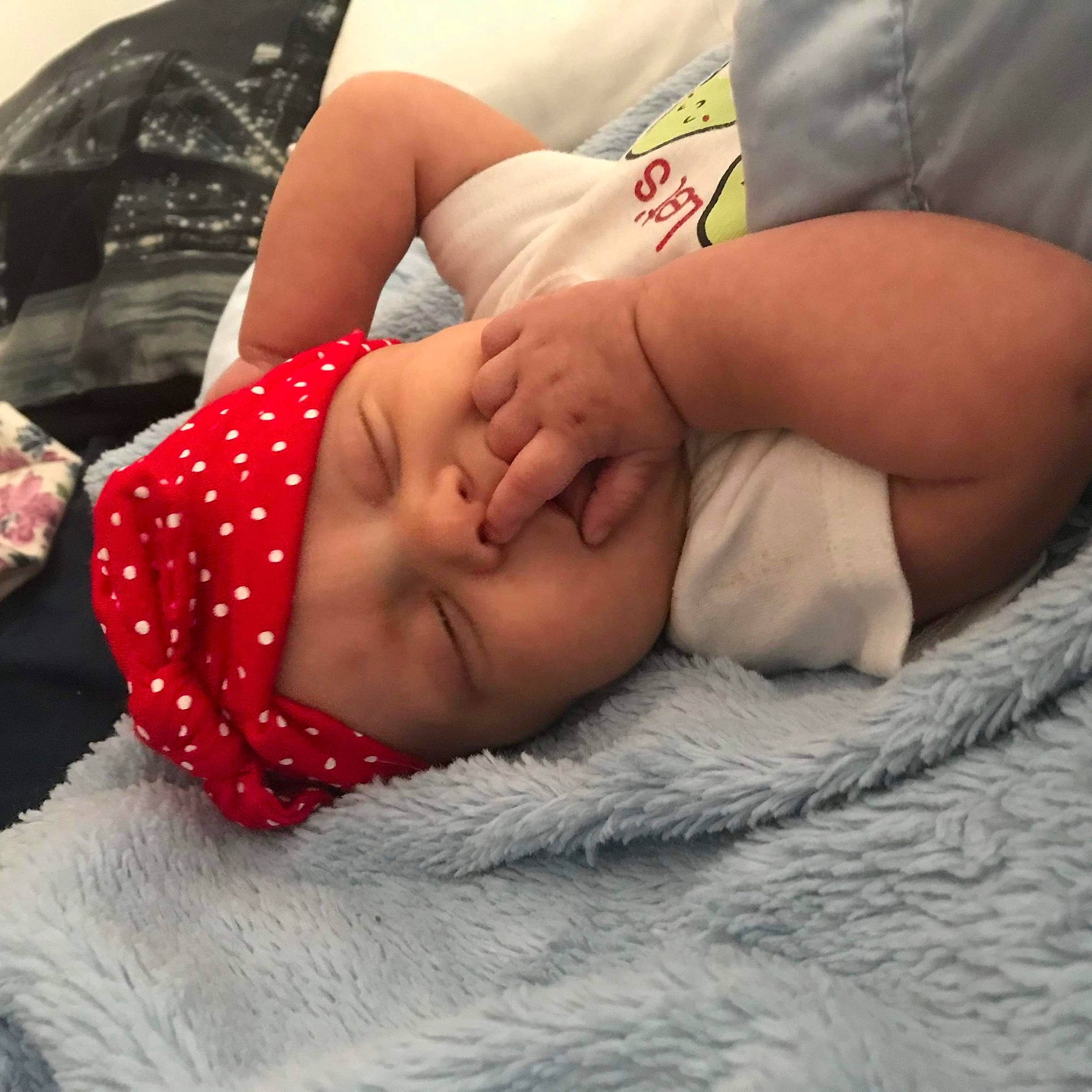 Adalina is registered to the contest to win money with this photo: abdomen, arm, baby, baby_sleeping, chest, comfort, elbow, finger, gesture, hand, headwear, human_leg, knee, leg, linens, mouth, nail, person, thigh, toddler