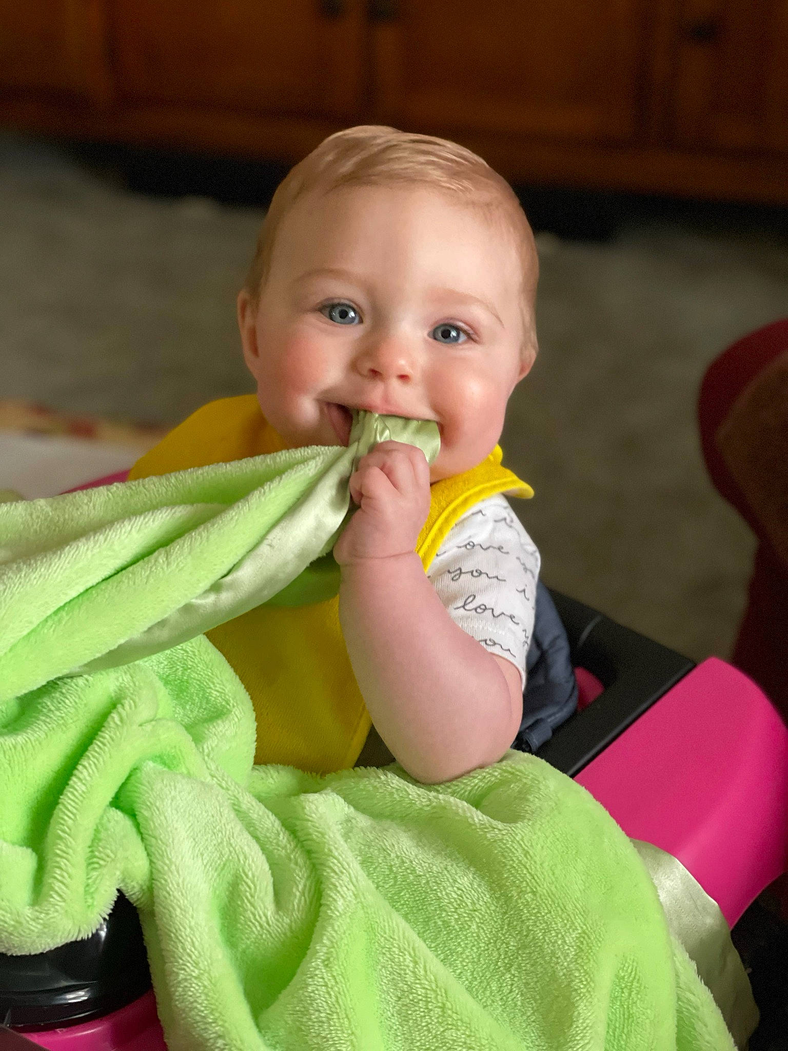 Paisley joined the competition — help win amazing prizes! arm, baby, baby_toddler_clothing, cheek, chin, comfort, eye, face, finger, fun, happy, head, human_body, iris, mouth, nose, person, sitting, skin, smile