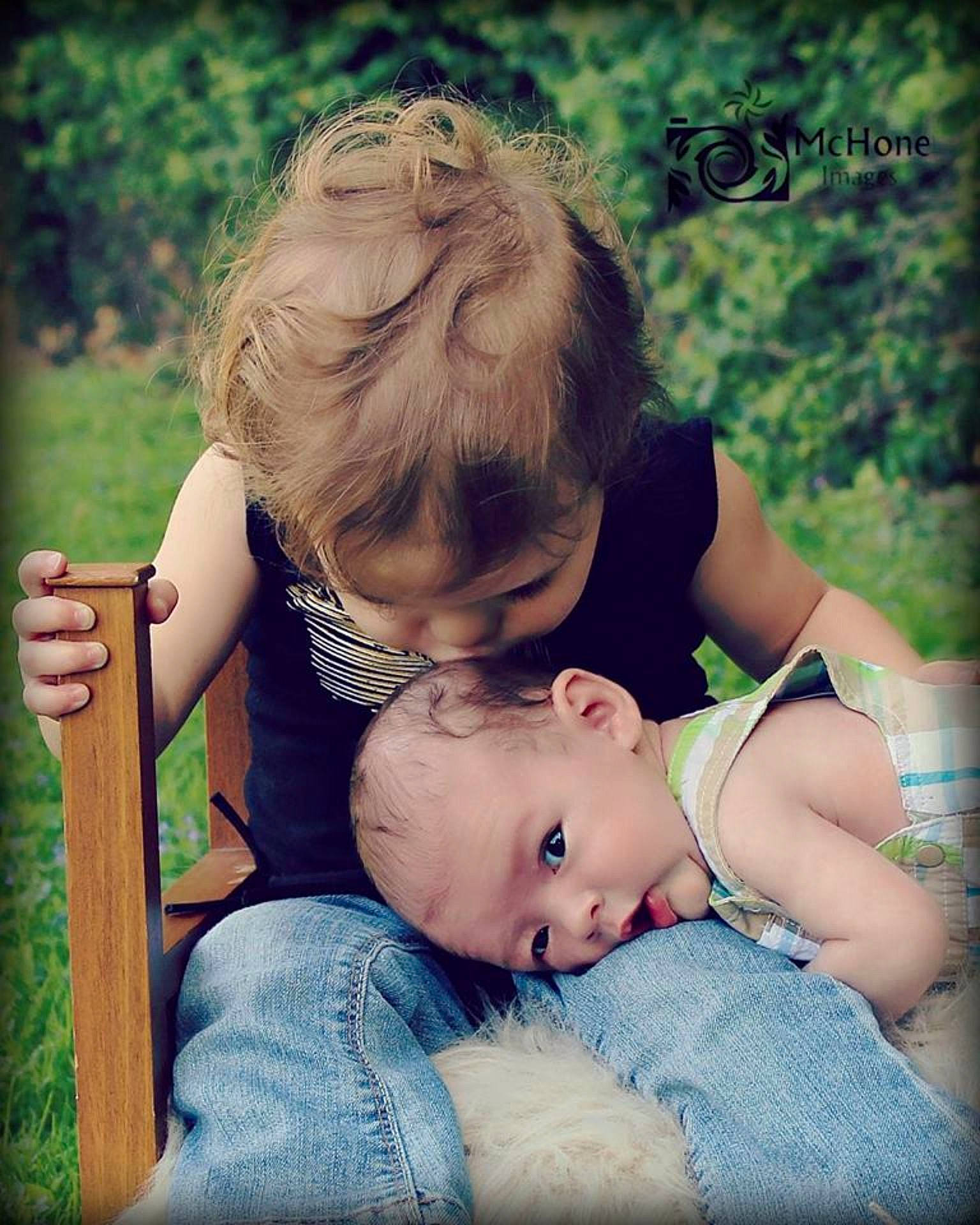 Autumn is registered to the contest to win money with this photo: beauty, child, emotion, eye, facial_expression, girl, grass, human_positions, infant, people, person, photograph, photography, portrait, portrait_photography, sitting, skin, smile, toddler, woman