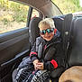 Cruze joined the competition — help win amazing prizes! child, car_seat, sunglasses, smile, jacket, pants, spiderman, dog, vehicle_interior, seatbelt, window, daylight, happy, young_child, blond_hair, casual_clothing, car, travel, road_trip, pet