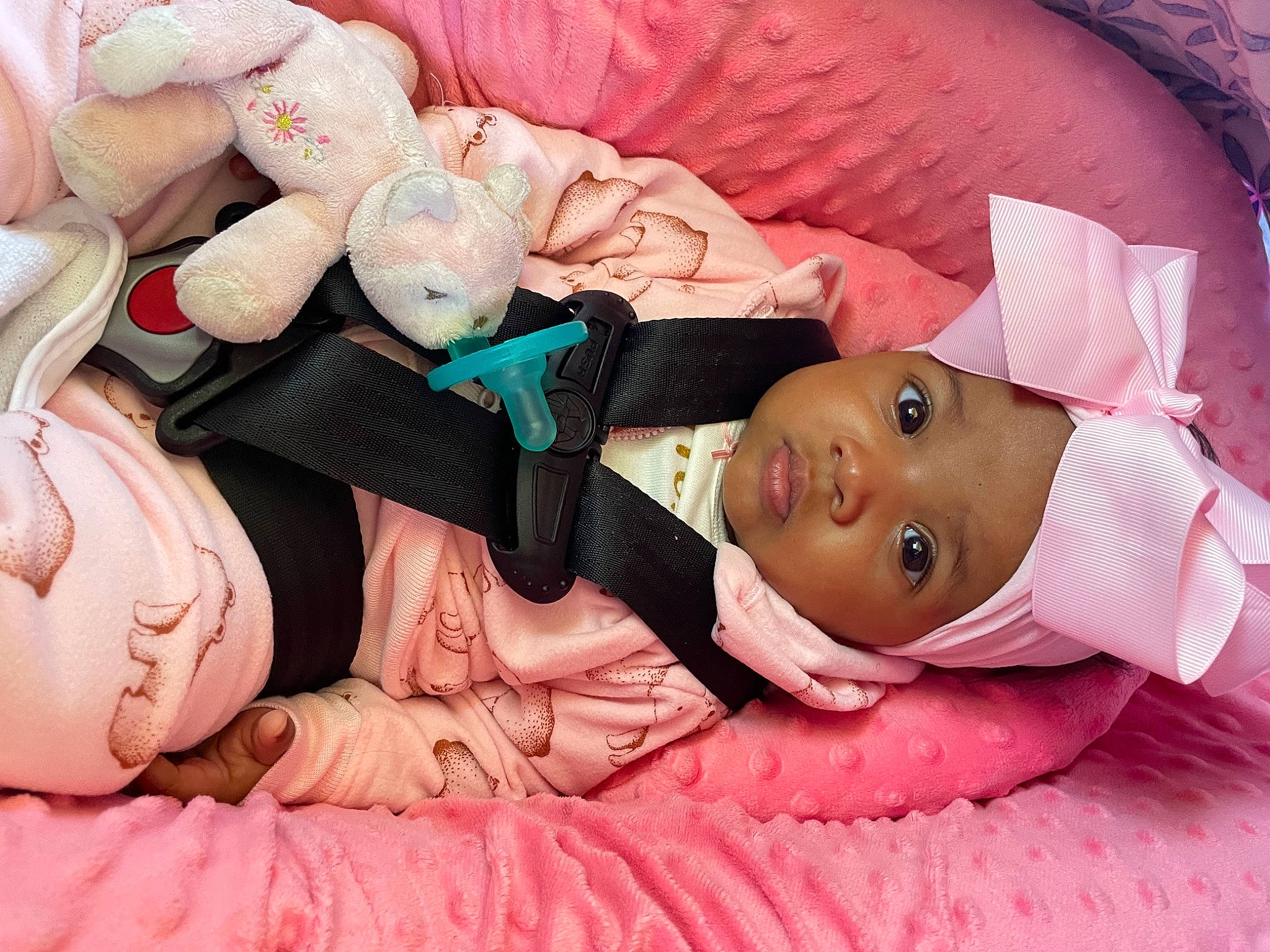 Caelan is registered to the contest to win money with this photo: baby, baby_products, baby_sleeping, baby_toddler_clothing, bedding, cheek, child, comfort, doll, hand, hat, headwear, human_body, linens, mouth, nail, person, pink, skin, thigh