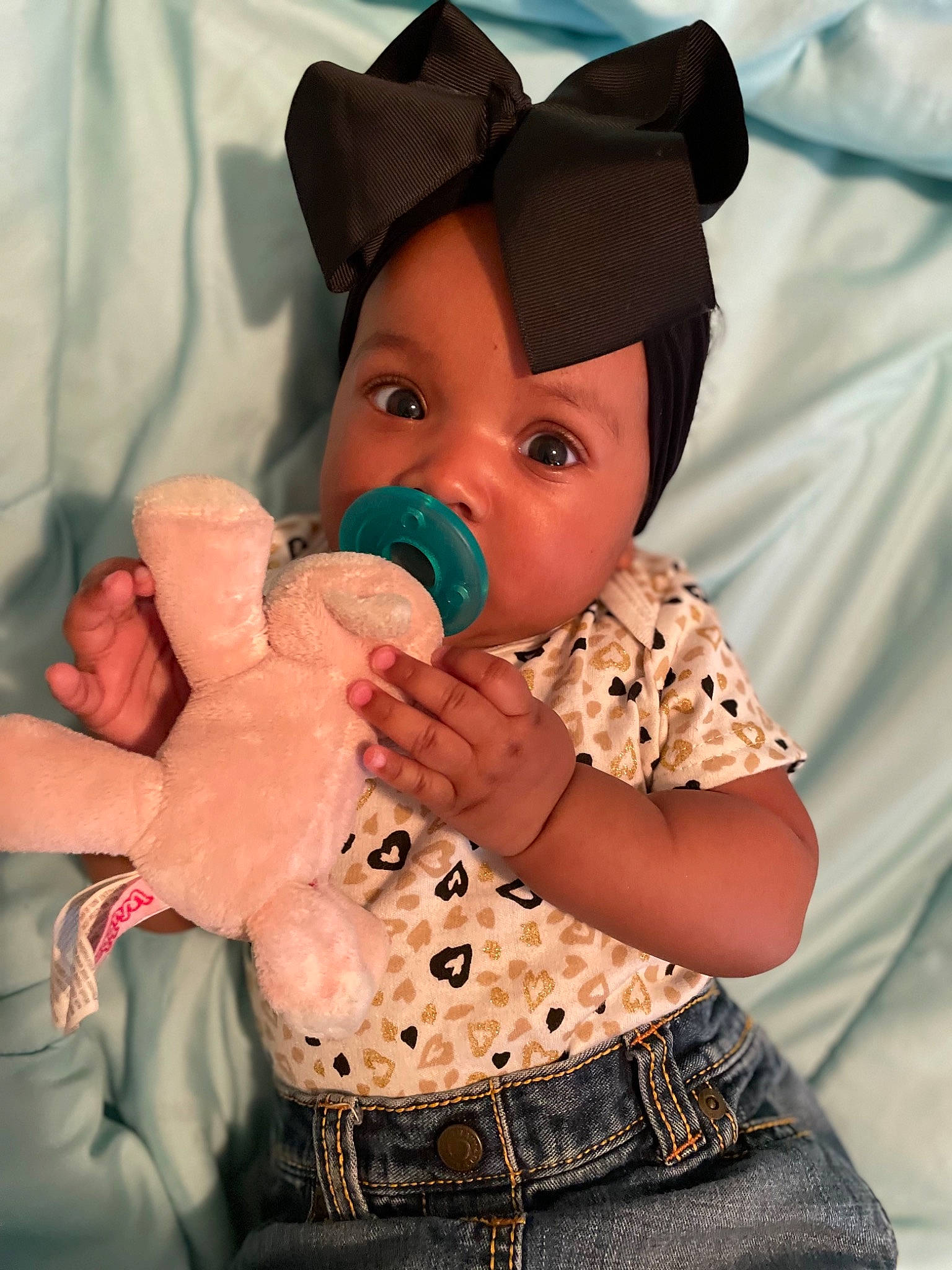 Caelan is registered to the contest to win money with this photo: baby, baby_toddler_clothing, cap, cheek, drinkware, finger, fun, gesture, hand, happy, hat, lip, nail, nose, person, pink, skin, sleeve, toddler, trunk