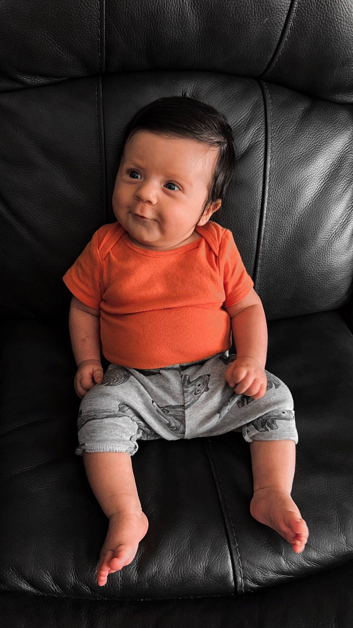 Barrett is registered to the contest to win money with this photo: baby, baby_toddler_clothing, cheek, comfort, eye, face, finger, flash_photography, head, human_body, human_leg, joint, knee, neck, person, shorts, sitting, sleeve, smile, t_shirt