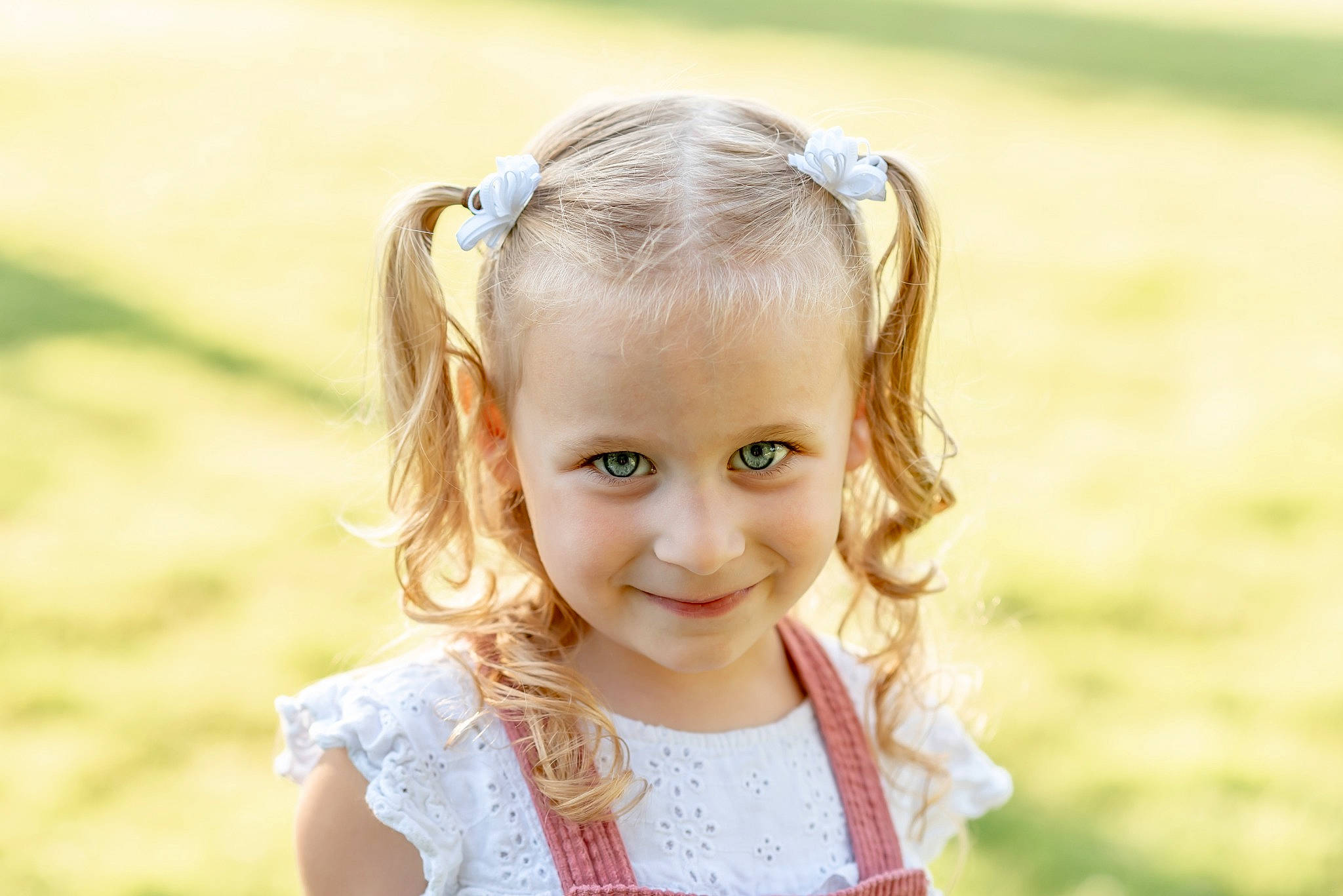 Willow is registered to the contest to win money with this photo: blond, child, dress, eye, eyelash, face, flash_photography, fun, grass, hair_tie, happy, iris, joy, lip, long_hair, people_in_nature, person, plant, smile, summer