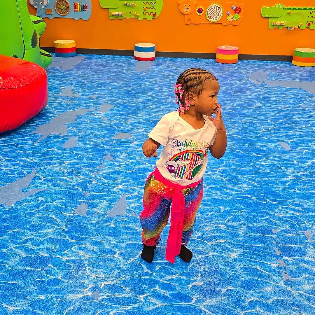 Kaliyah is registered to the contest to win money with this photo: adult, child, clothing, face, female, girl, head, indoors, male, man, outdoors, pants, person, photography, playarea, pool, portrait, shorts, swimmingpool, water
