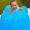 baby, smiling, blue_plush, teddy_bear, outdoor, grass, blanket, child, happy, cute, infant, toy, plush, person, portrait, summer, sunny, playful, nature, head