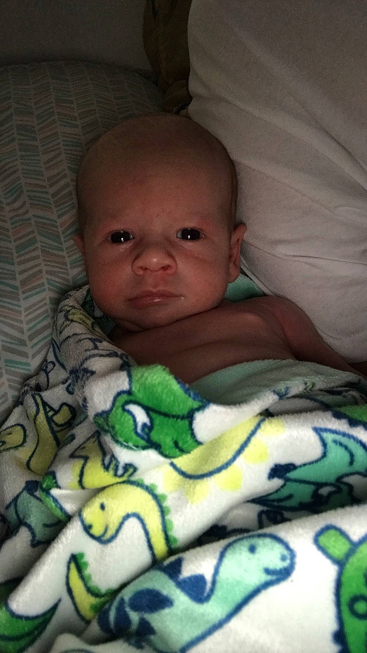 Brentlee is registered to the contest to win money with this photo: baby, bedtime, blanket, cheek, child, eye, face, green, head, mouth, nose, person, skin, toddler