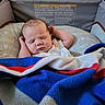Amarra is registered to the contest to win money with this photo: architecture, baby, bed, blanket, building, childbirth, crib, face, furniture, head, hospital, infantbed, newborn, person, photography, portrait, quilt, sleeping, towel