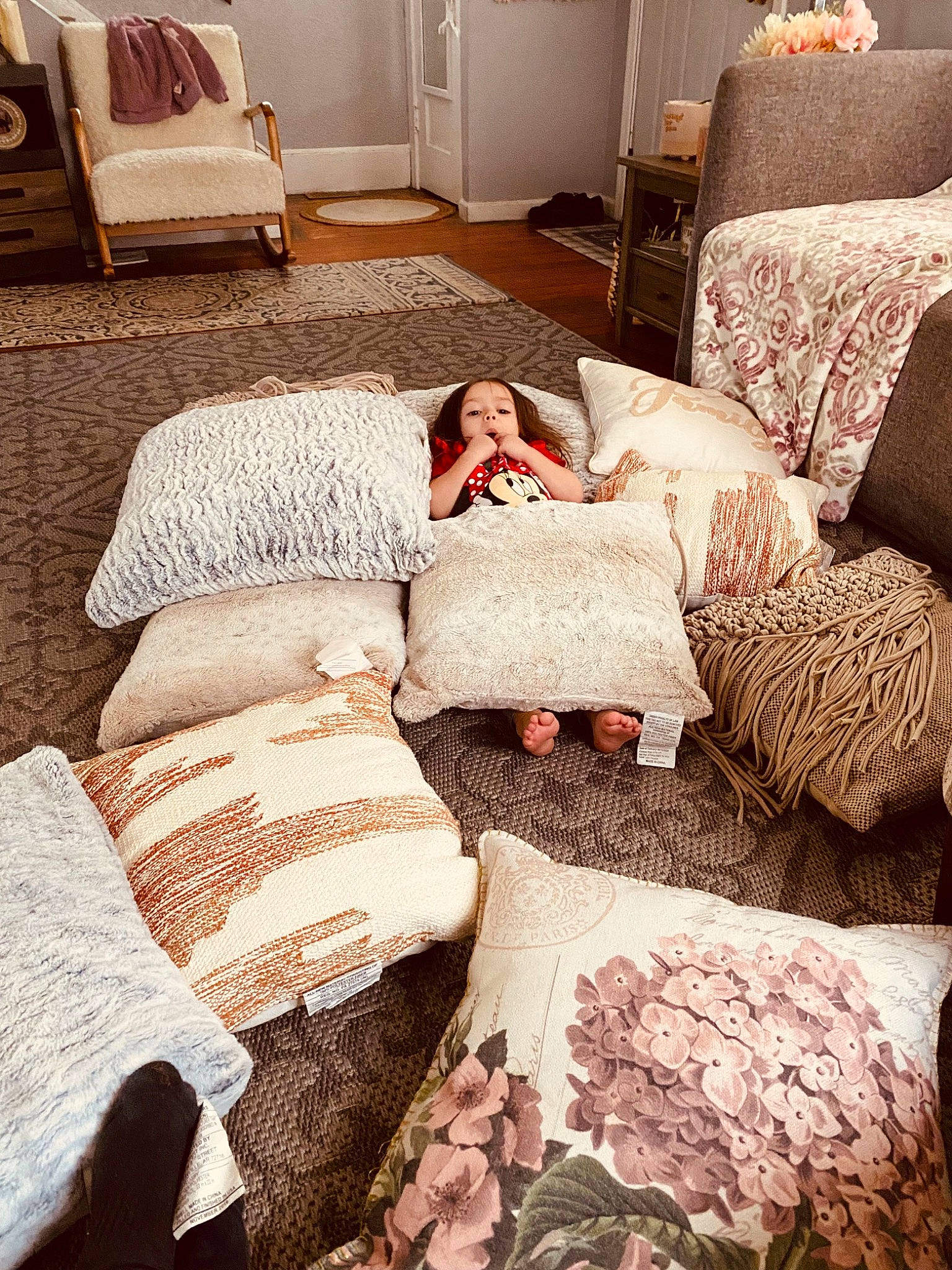 Amila joined the competition — help win amazing prizes! bedding, bedroom, comfort, couch, floor, flooring, furniture, hardwood, interior_design, lamp, linens, living_room, person, pillow, real_estate, table, textile, tints_and_shades, wall, white