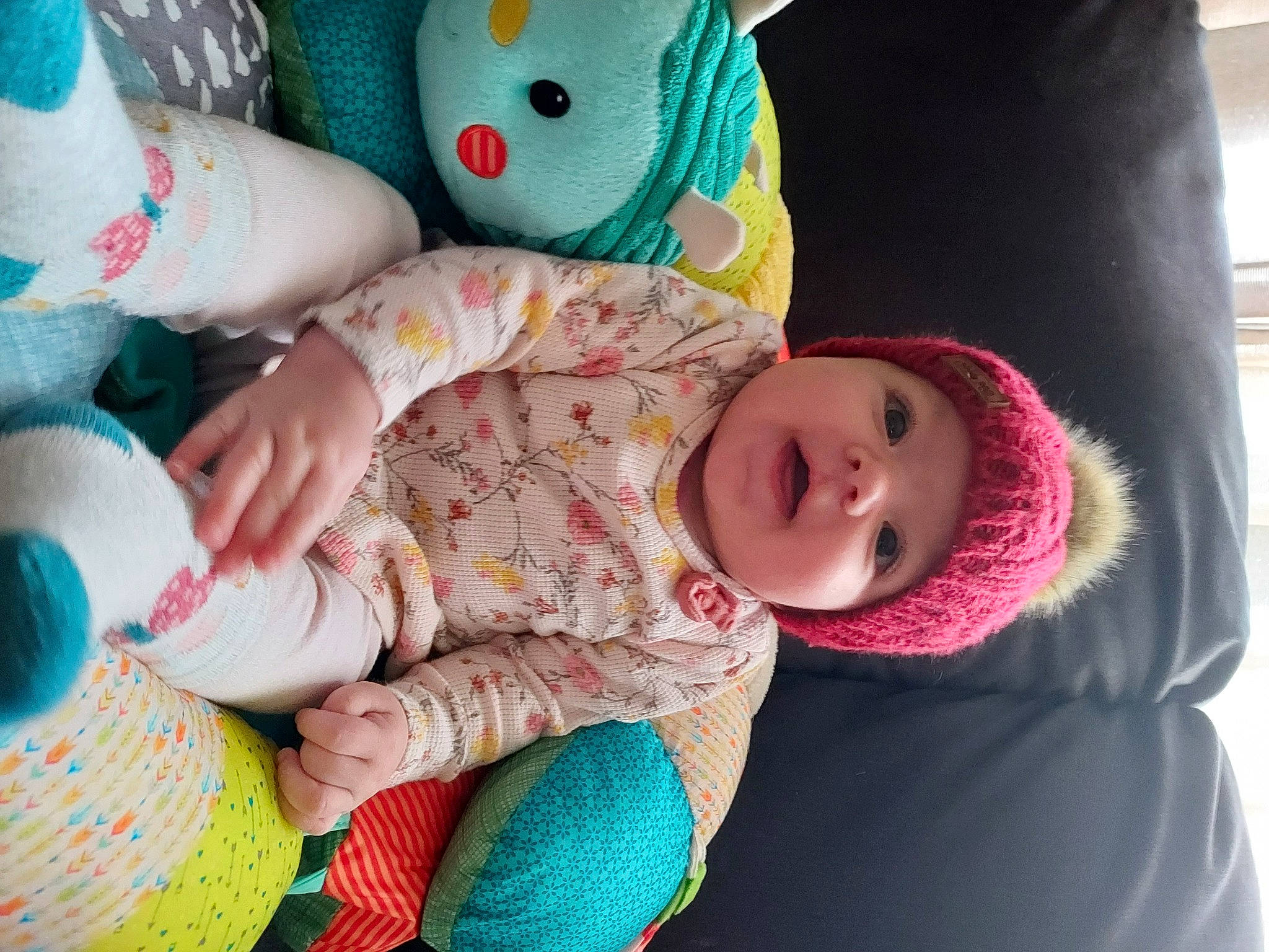 Mila joined the competition — help win amazing prizes! baby, baby_toddler_clothing, blue, cheek, comfort, eye, facial_expression, green, headwear, mammal, nose, organ, person, pink, product, skin, textile, toddler, toy, vertebrate