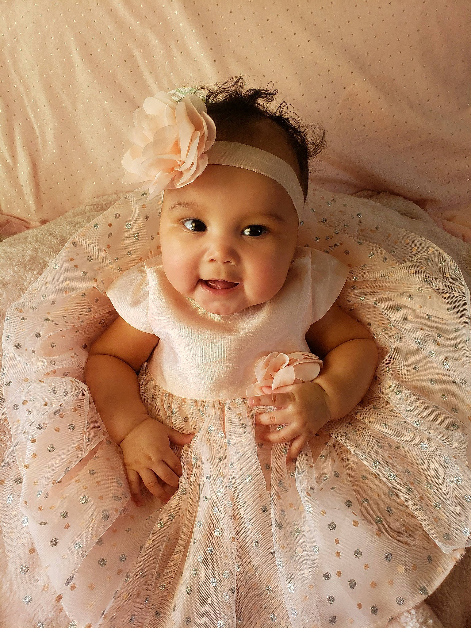 Itzel is registered to the contest to win money with this photo: baby, cheek, child, dress, eye, face, hair_accessory, head, headband, headgear, headpiece, iris, person, skin, smile, toddler