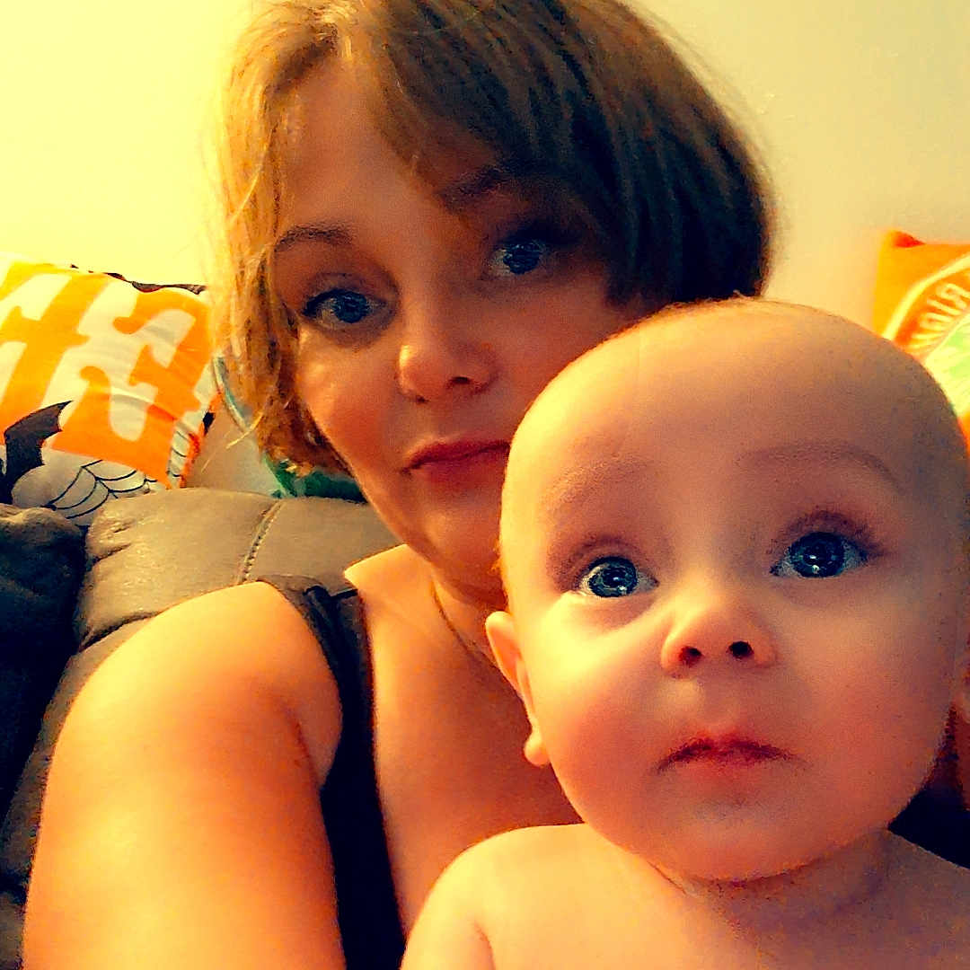 Jerald joined the competition — help win amazing prizes! arm, baby, casual, child, closeup, comfort, couch, expression, face, family, hair, home, indoor, looking, person, pillow, portrait, seated, skin, woman