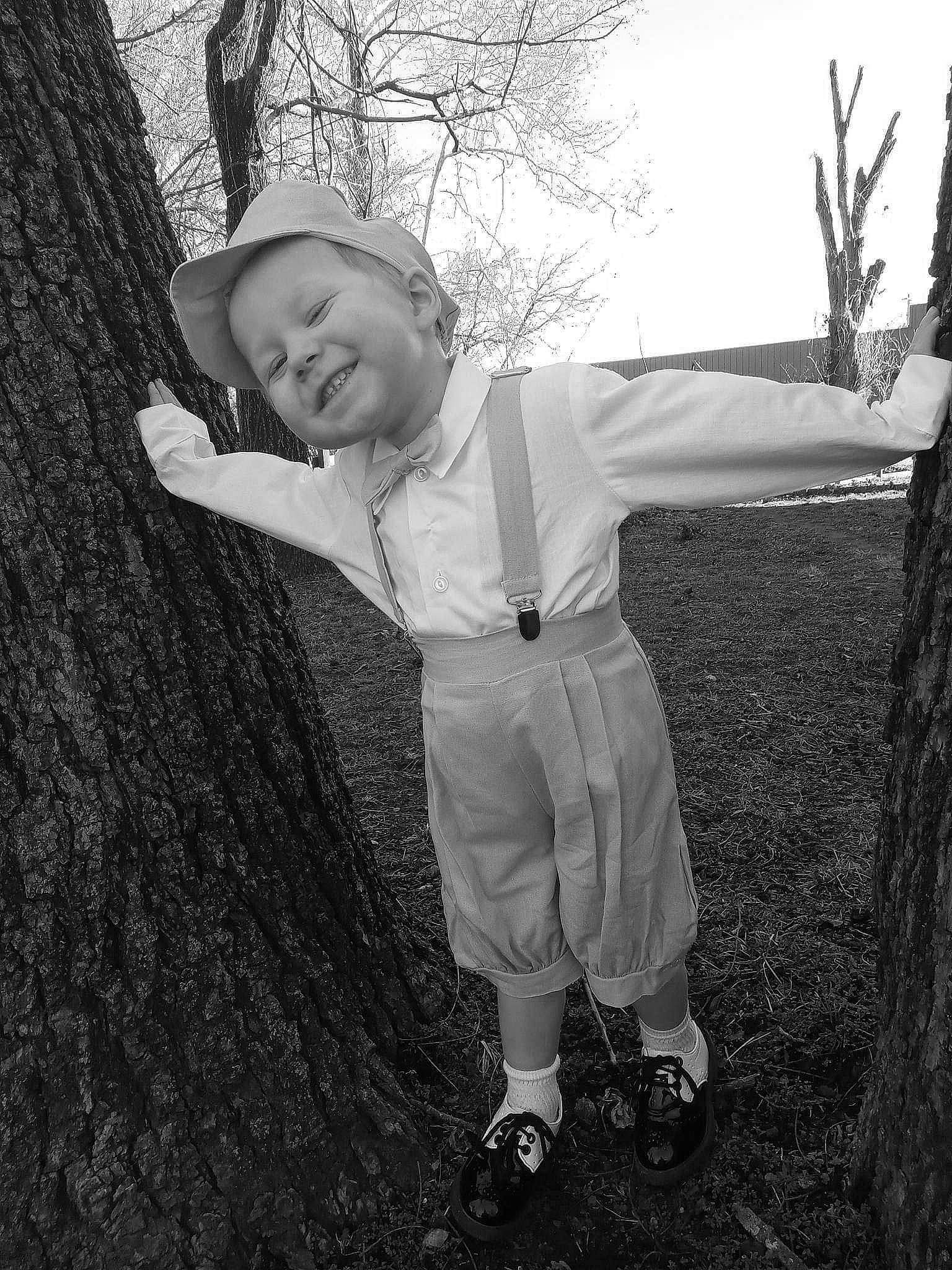 Shyloh is registered to the contest to win money with this photo: black, black_and_white, child, eye, flash_photography, fun, gesture, grass, happy, joy, monochrome, monochrome_photography, people_in_nature, person, photograph, plant, recreation, sky, smile, style