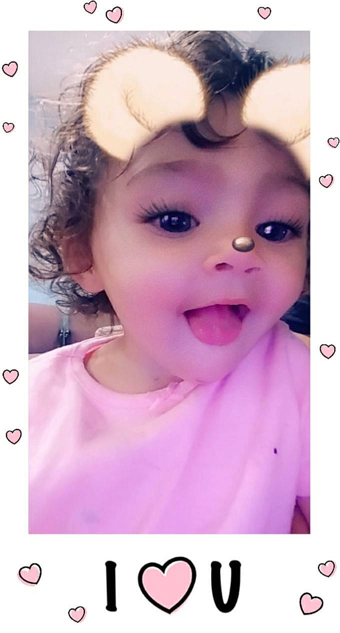 Layla is registered to the contest to win money with this photo: baby, cheek, child, chin, ear, eye, eyebrow, eyelash, face, facial_expression, forehead, head, lip, nose, person, photo_caption, photography, pink, selfie, smile