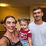 Aurora joined the competition — help win amazing prizes! child, family, family_photo, father, floral_dress, girl, home, indoors, man, mother, parents, pigtails, pink_shirt, portrait, selfie, smiling, standing, toddler, white_t_shirt, woman
