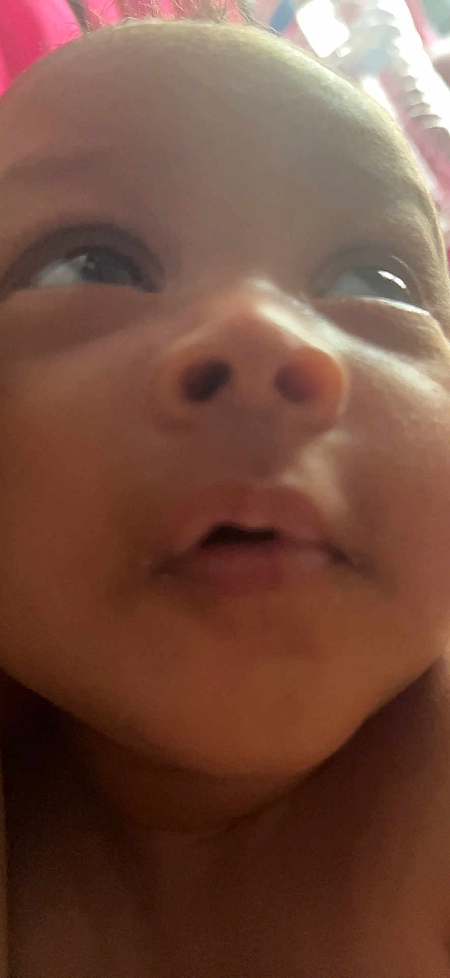 Rahmani Kidd is registered to the contest to win money with this photo: baby, face, close_up, eyes, nose, mouth, skin, infant, portrait, child, expression, curious, soft_lighting, indoors, young, head, cheeks, human, person, blurred_background