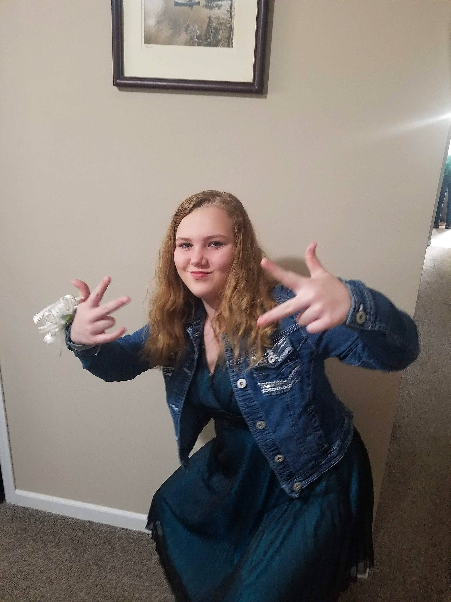 Hanna is registered to the contest to win money with this photo: arm, blond, denim, finger, fun, gesture, hand, jacket, jeans, joy, leather, leather_jacket, long_hair, outerwear, person, photography, shoulder, sitting, textile, thumb