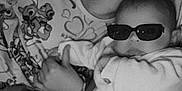 Maïssa a rejoint le concours — aidez-le/la à gagner de superbes lots ! accessories, baby, bodypart, clothing, couch, cushion, face, finger, furniture, glasses, hand, happy, head, homedecor, person, photography, portrait, selfie, smile, sunglasses