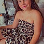Maïssa participe au concours pour gagner de l'argent avec cette photo : casual, child, couch, decor, dress, face, furniture, girl, hair, headband, home, indoors, leopard_print, person, portrait, relaxed, shelf, sitting, smile, young