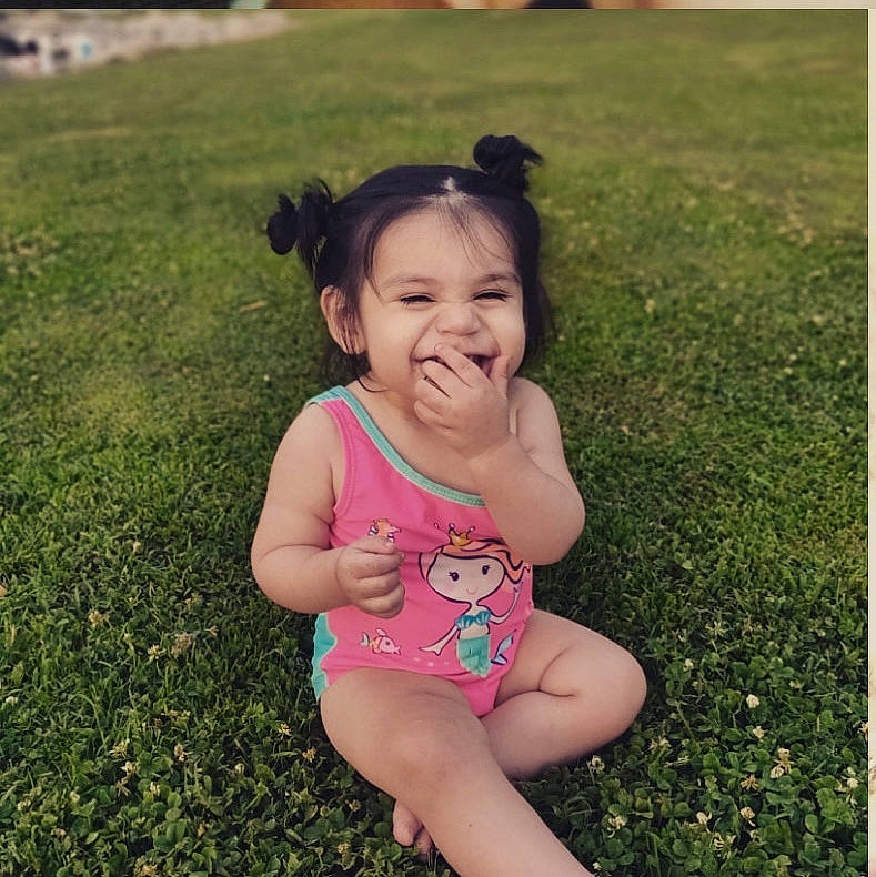Lilyana Grace joined the competition — help win amazing prizes! baby, beauty, child, face, facial_expression, fun, grass, hand, happy, head, joy, people, person, pink, plant, play, skin, smile, snapshot, summer