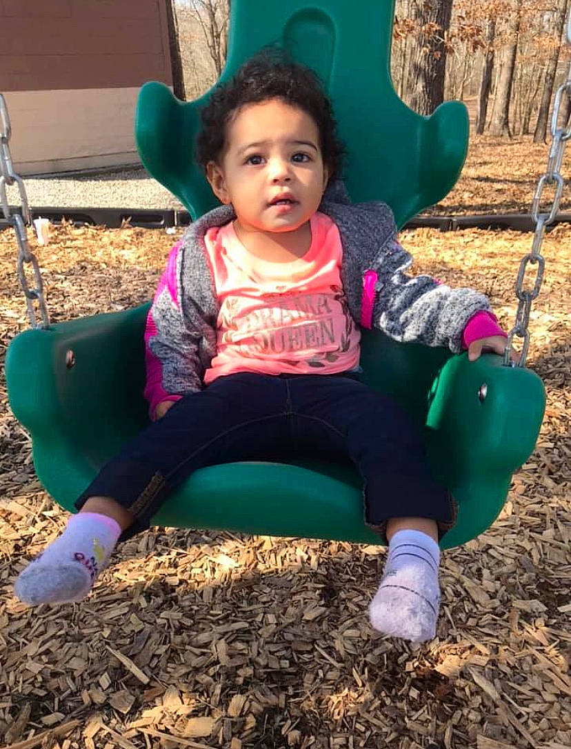Aubriana joined the competition — help win amazing prizes! adaptation, child, fun, happy, people, person, plant, play, playground, sitting, smile, soil, swing, toddler, tree