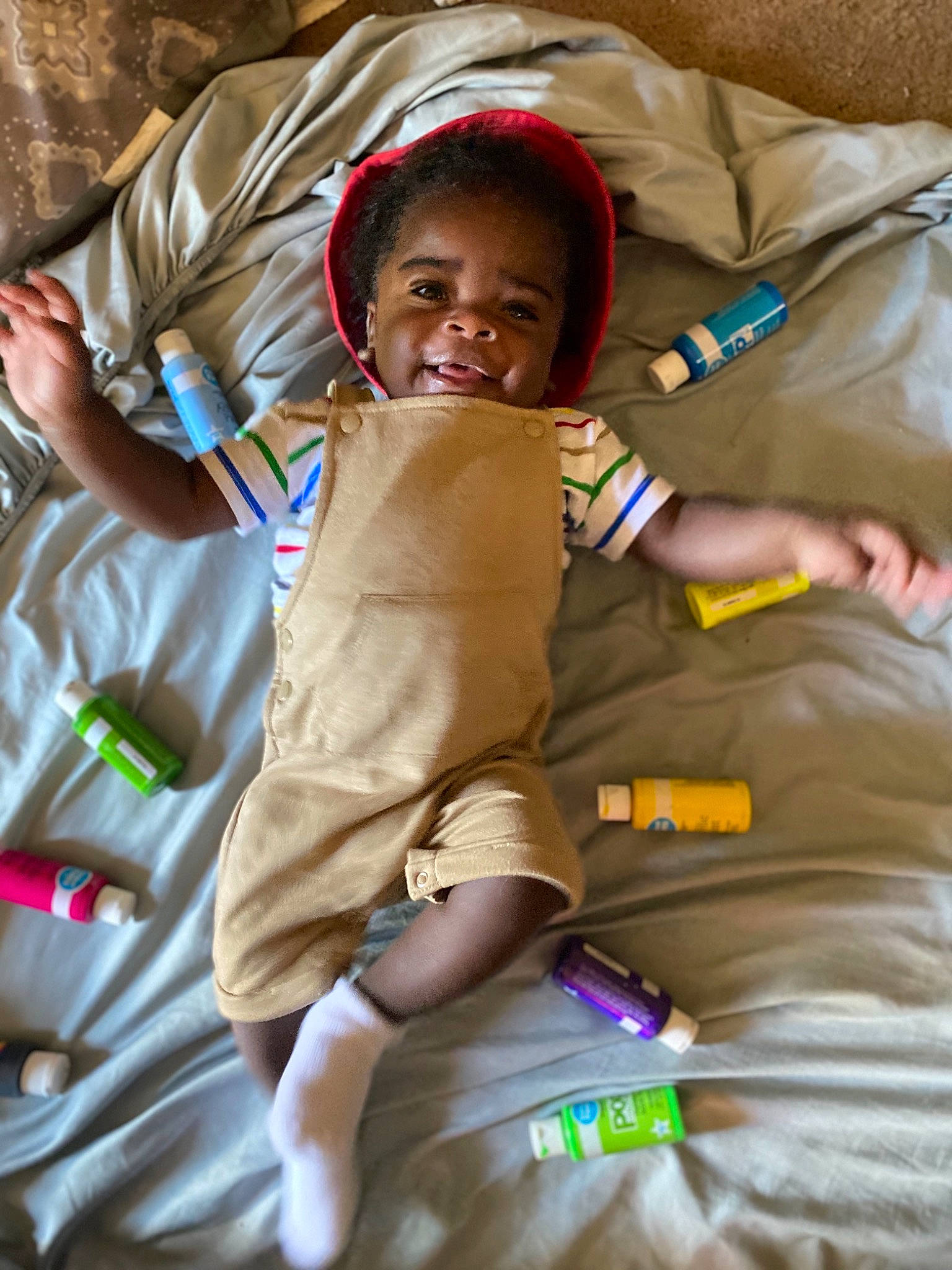 King is registered to the contest to win money with this photo: baby, child, fun, person, play, smile, toddler, vacation