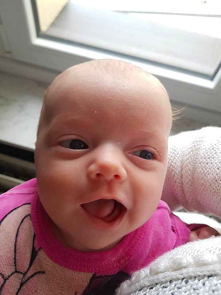 Mia participe au concours pour gagner de l'argent avec cette photo : cheek, child, chin, ear, eye, eyebrow, face, finger, forehead, girl, head, infant, laughter, lip, mouth, nose, person, skin, smile, toddler