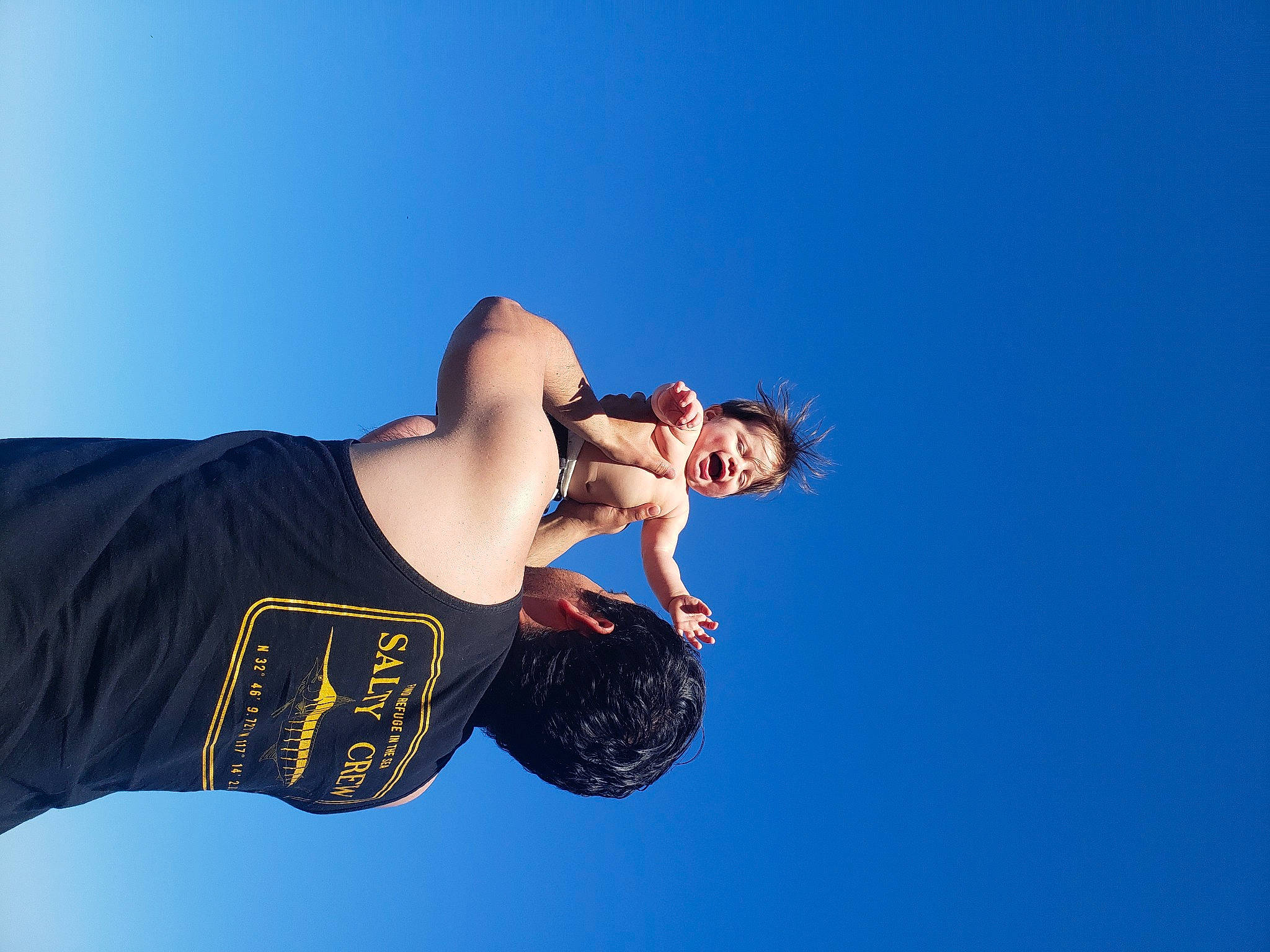 Bronson joined the competition — help win amazing prizes! elbow, electric_blue, eyewear, flash_photography, fun, gesture, glasses, happy, human_body, knee, landscape, leisure, person, portrait_photography, sitting, sky, sleeve, sportswear, sunglasses, t_shirt