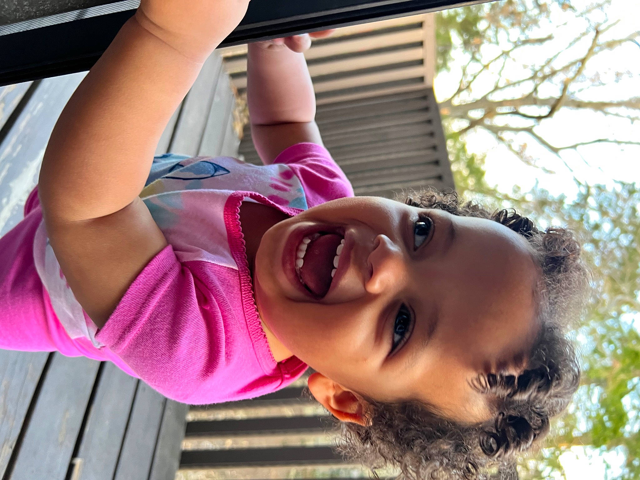 Maliyah is registered to the contest to win money with this photo: cool, dress, face, facial_expression, glasses, grass, happy, hat, leisure, lip, people_in_nature, person, pink, plant, skin, sky, smile, sunlight, tree, water