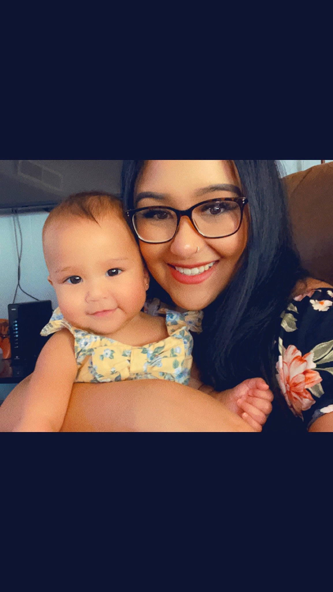 Alaïa is registered to the contest to win money with this photo: black_hair, cheek, cool, eye, face, finger, flash_photography, friendship, gesture, glasses, happy, human_body, iris, joy, mouth, person, skin, smile, thigh, toddler