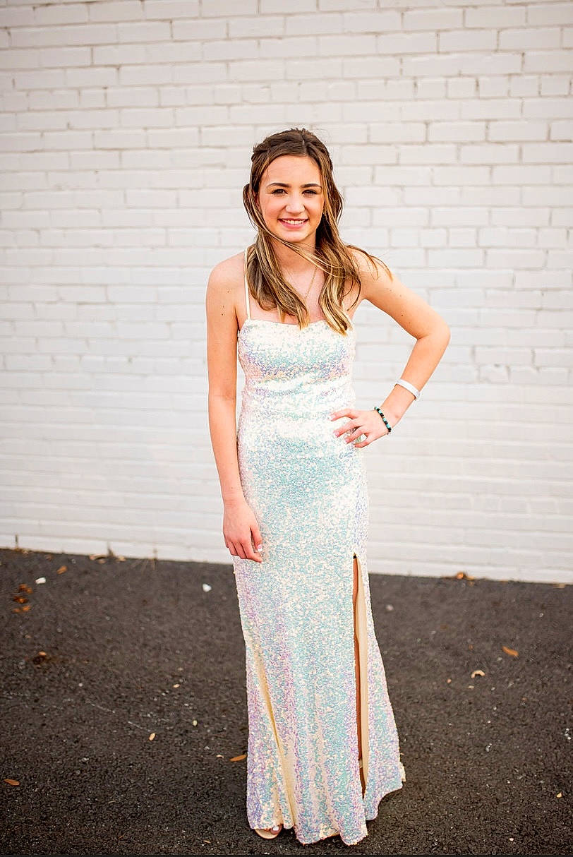 Kylie is registered to the contest to win money with this photo: bridal_party_dress, clothing, day_dress, dress, electric_blue, fashion_design, flash_photography, formal_wear, gown, happy, human_leg, joy, long_hair, one_piece_garment, people_in_nature, person, sleeve, smile, thigh, tire