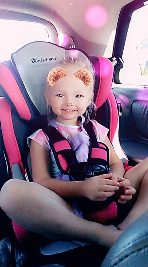 Harlie joined the competition — help win amazing prizes! auto_part, automotive_design, car_seat, car_seat_cover, child, comfort, finger, fun, happy, head_restraint, joy, lap, leg, motor_vehicle, person, pink, purple, shorts, skin, smile