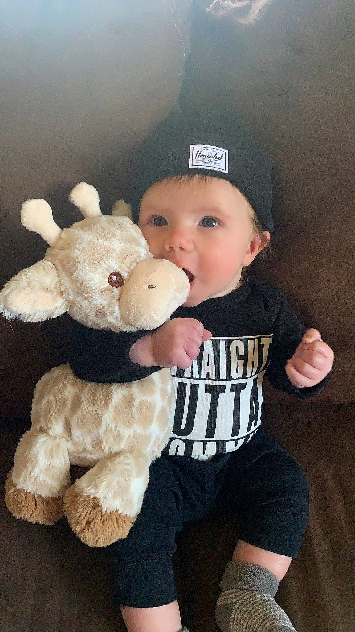 Sterling is registered to the contest to win money with this photo: baby, baby_products, baby_toddler_clothing, baseball_cap, cap, child, flash_photography, fun, fur, gesture, happy, hat, headwear, mammal, person, plush, skin, sleeve, stuffed_toy, t_shirt