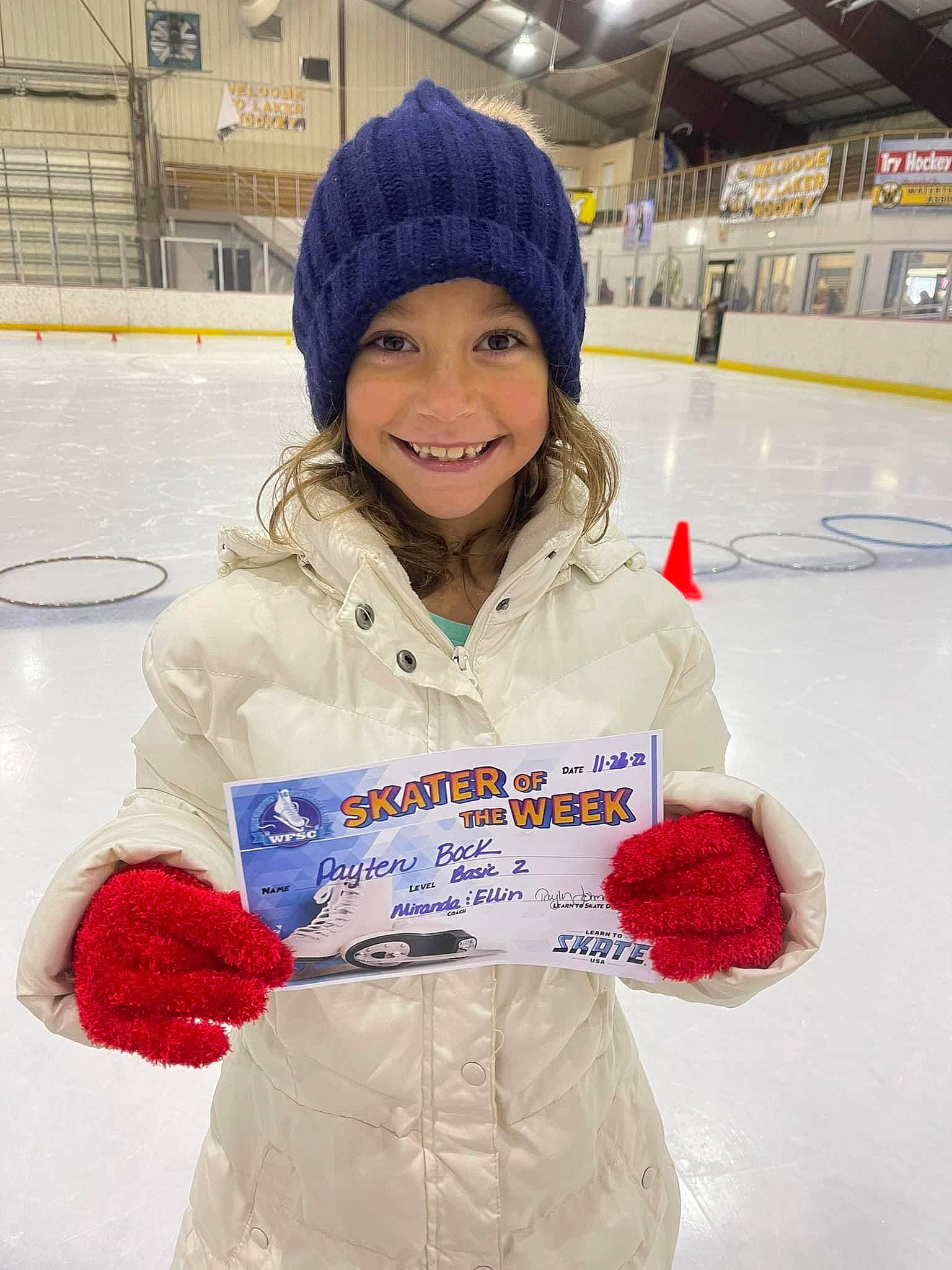 Payten is registered to the contest to win money with this photo: cap, child, electric_blue, freezing, fun, glove, headgear, headwear, ice_hockey_equipment, ice_rink, ice_skating, jacket, joy, knit_cap, outerwear, person, recreation, sleeve, smile, sports_gear