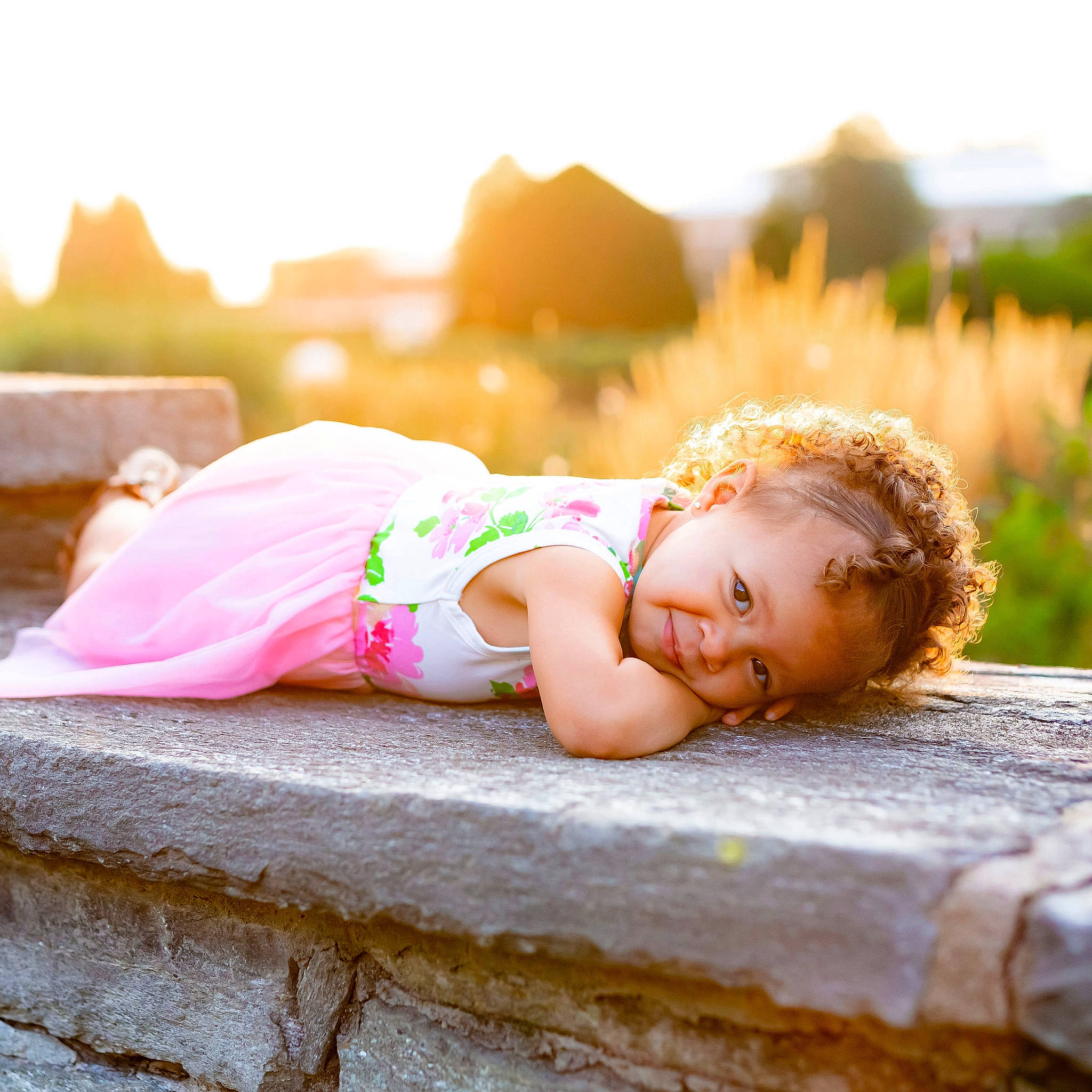 Kamryn is registered to the contest to win money with this photo: baby, baby_toddler_clothing, blond, child, flash_photography, grass, happy, human_leg, landscape, leisure, magenta, people_in_nature, person, plant, sitting, sky, stock_photography, summer, sunlight, toddler
