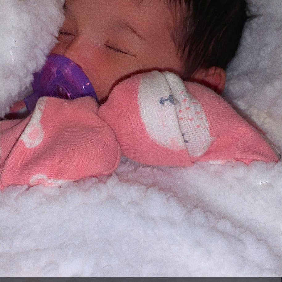 Ryder joined the competition — help win amazing prizes! baby, baby_sleeping, bedding, bedtime, cheek, child, comfort, freezing, fur, happy, linens, nose, pink, skin, snow, stuffed_toy, textile, toddler, toy, wool