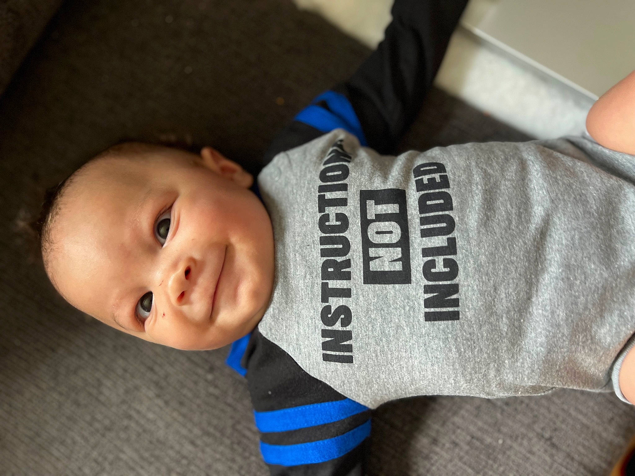 Kaiden joined the competition — help win amazing prizes! baby, baby_products, baby_toddler_clothing, cheek, child, elbow, electric_blue, finger, font, glove, hand, happy, human_body, joy, knee, person, personal_protective_equipment, sleeve, smile, thumb