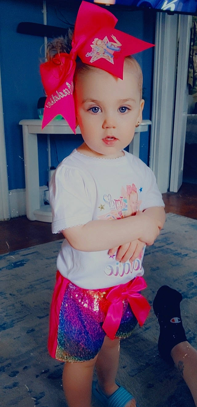 Maddelynn is registered to the contest to win money with this photo: baby, baby_toddler_clothing, blue, cap, child, cool, costume_hat, electric_blue, fun, happy, hat, head, magenta, person, pink, red, sleeve, standing, t_shirt, toddler