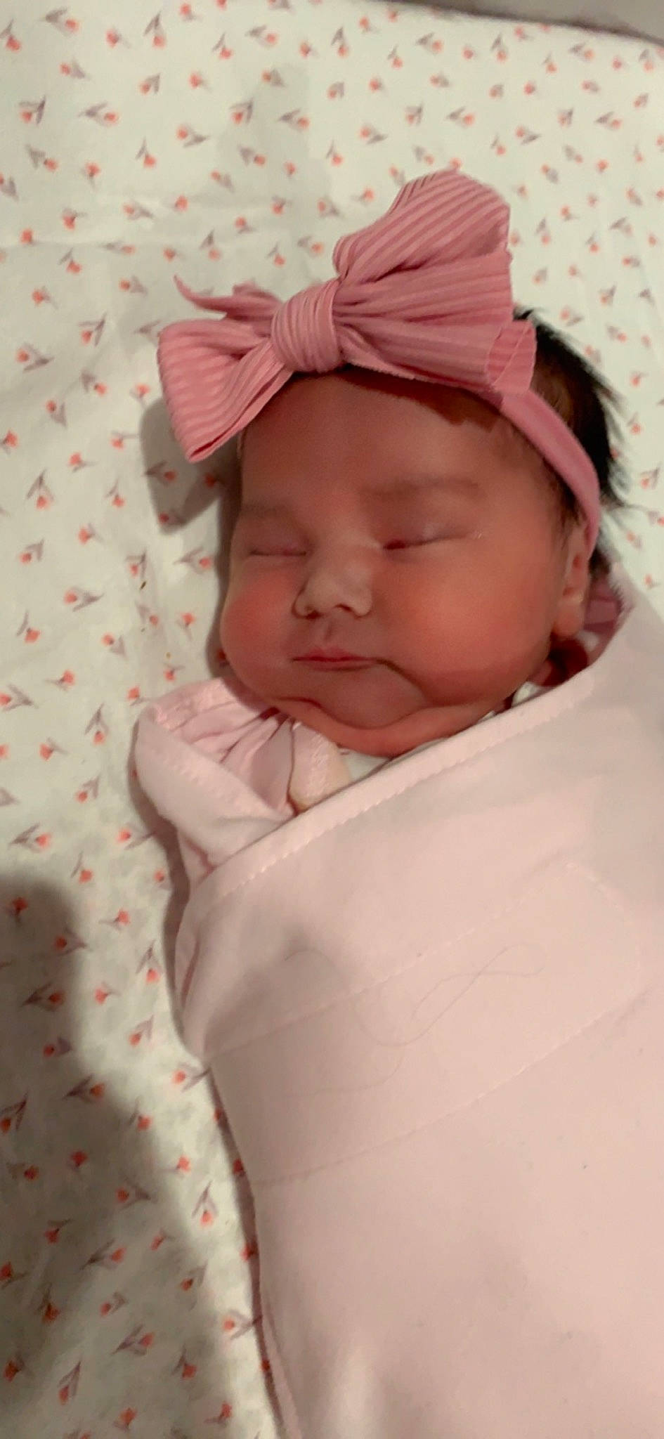 Aiyanna is registered to the contest to win money with this photo: baby, baby_products, baby_toddler_clothing, carmine, child, comfort, face, headwear, linens, magenta, pattern, peach, person, sleeve, toddler