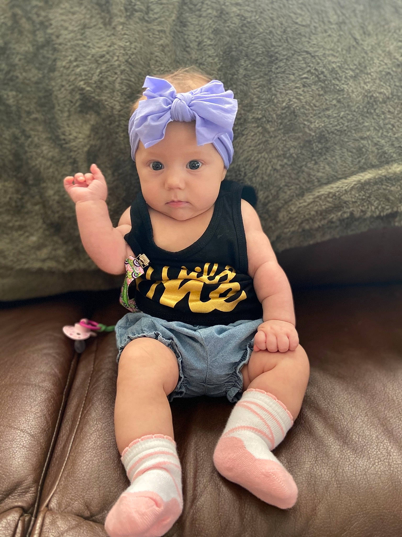 Vivian is registered to the contest to win money with this photo: baby, baby_toddler_clothing, cap, cheek, chin, comfort, costume_hat, eye, face, finger, flash_photography, fun, happy, headwear, leg, person, pink, skin, sleeve, textile